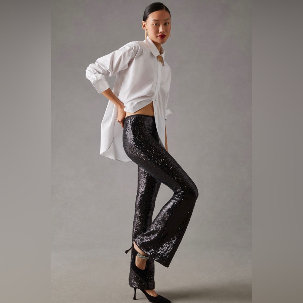Anthropologie navy sequin high waisted, flare pants.  New with tags!  Size 0.